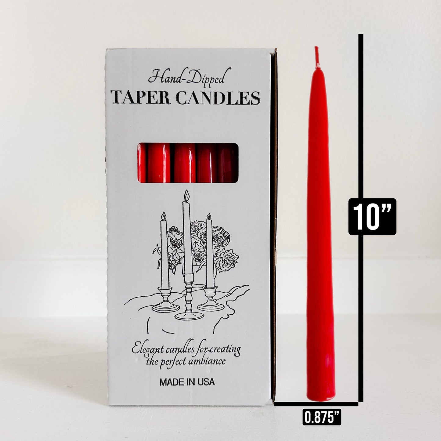 Red taper candle next to its packaging with dimensions
