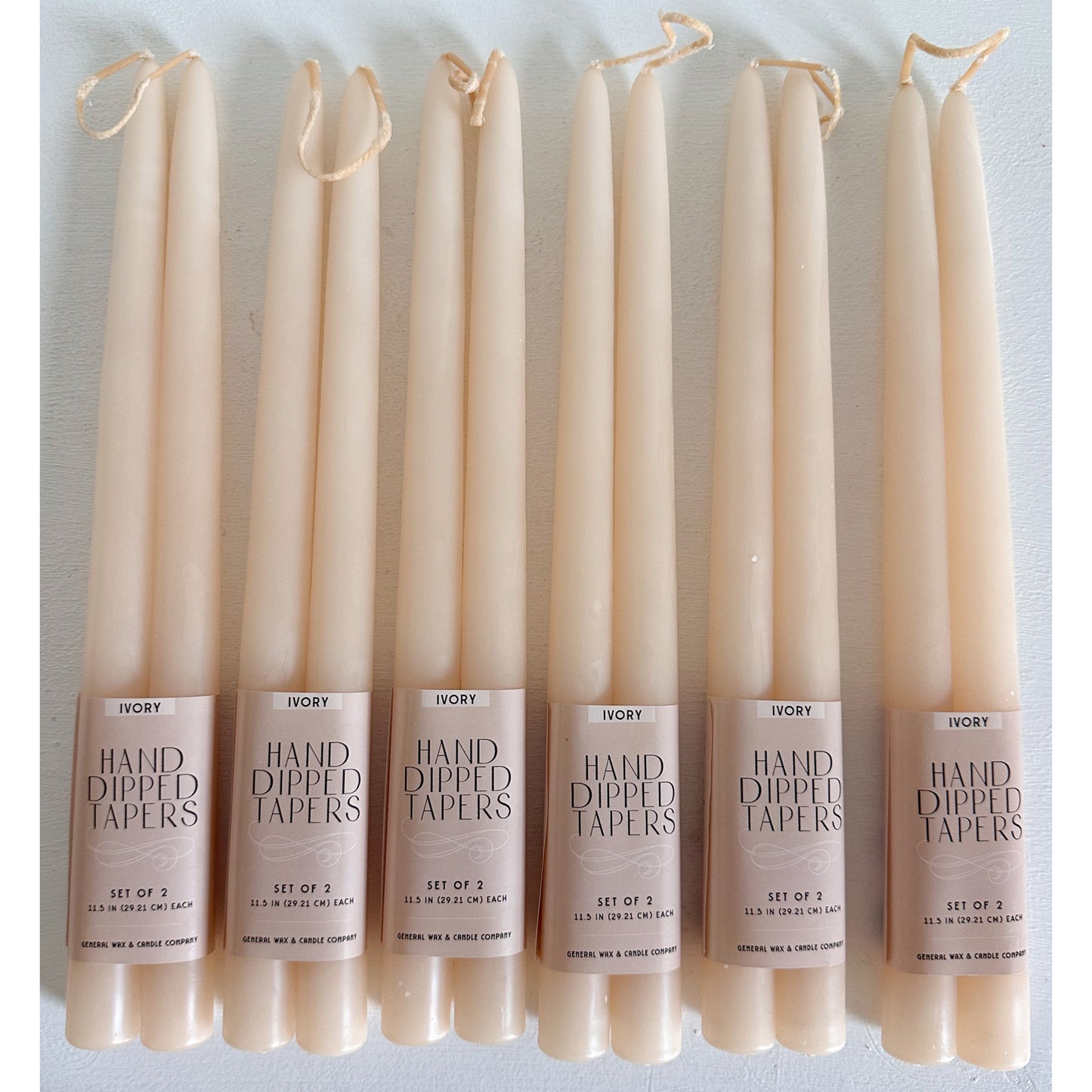 classic ivory taper candles for weddings and events