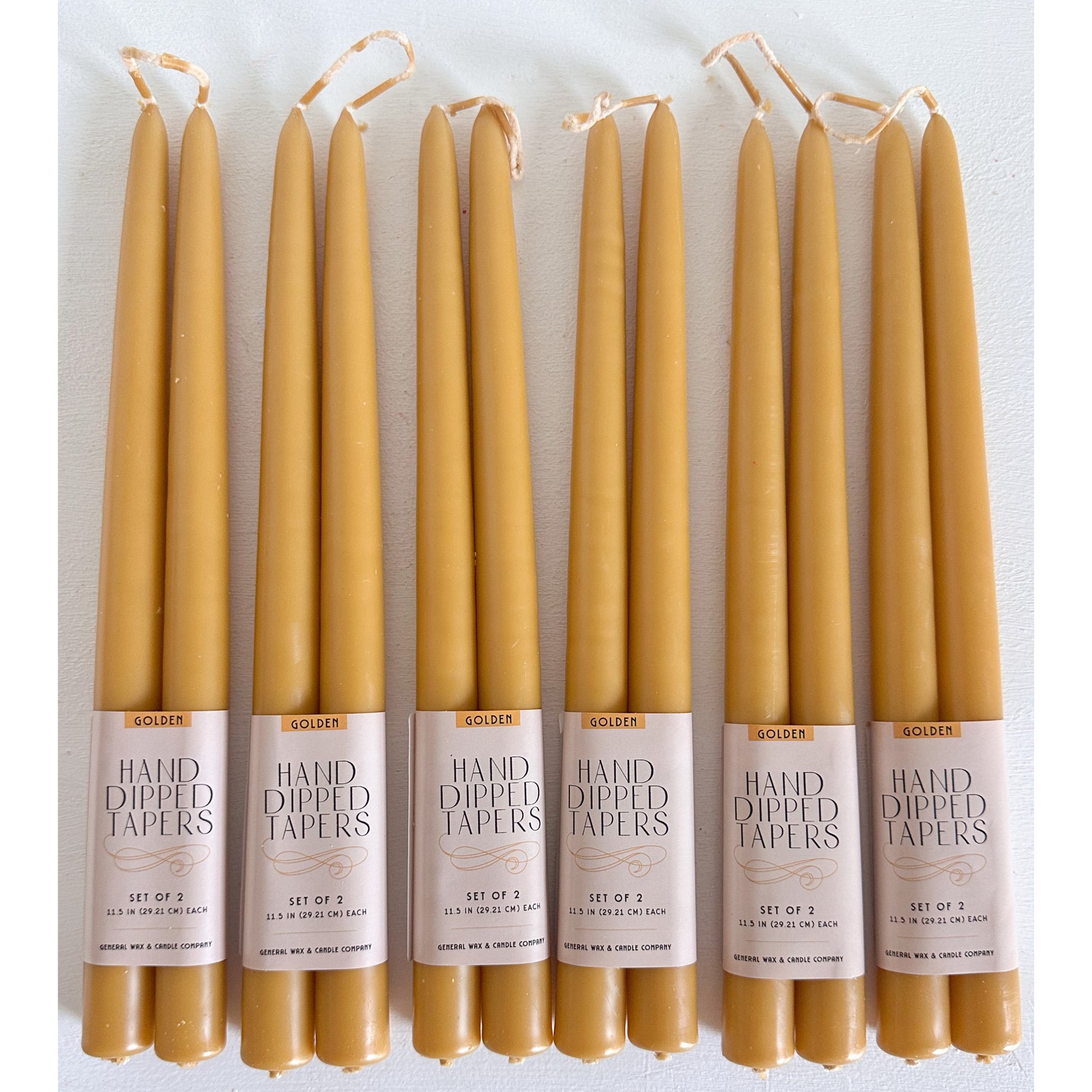 gold taper candles for weddings and events
