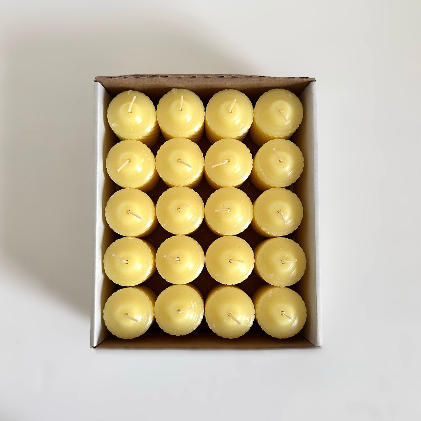 long lasting yellow votive candle for home