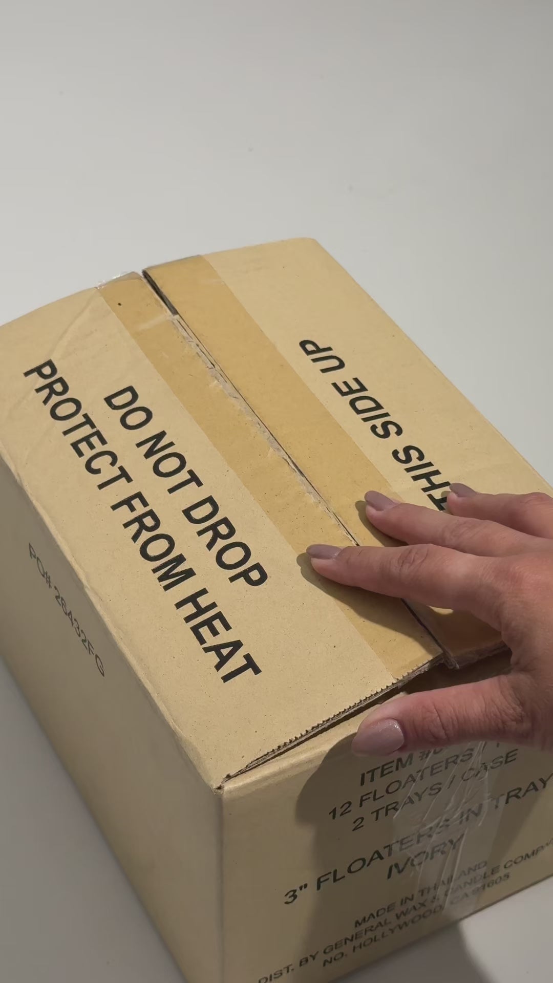 Ivory floating candles for centerpieces and pool décor