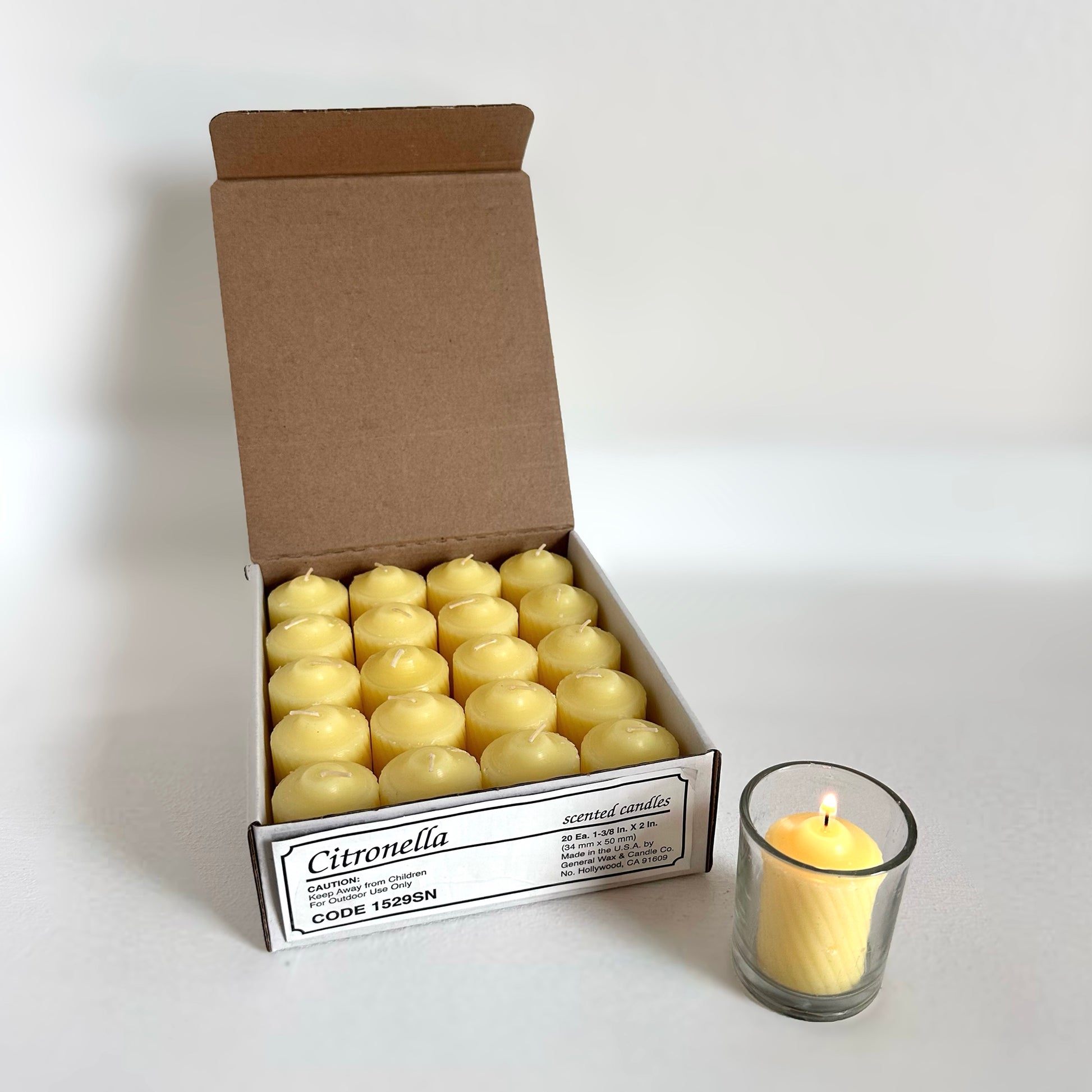 scented yellow votive candle Scentinella