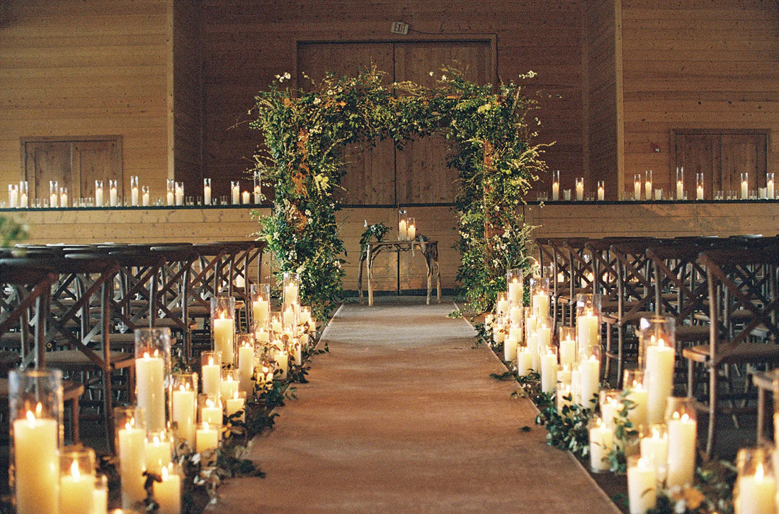 wedding hall decoration with pillar candles in jar