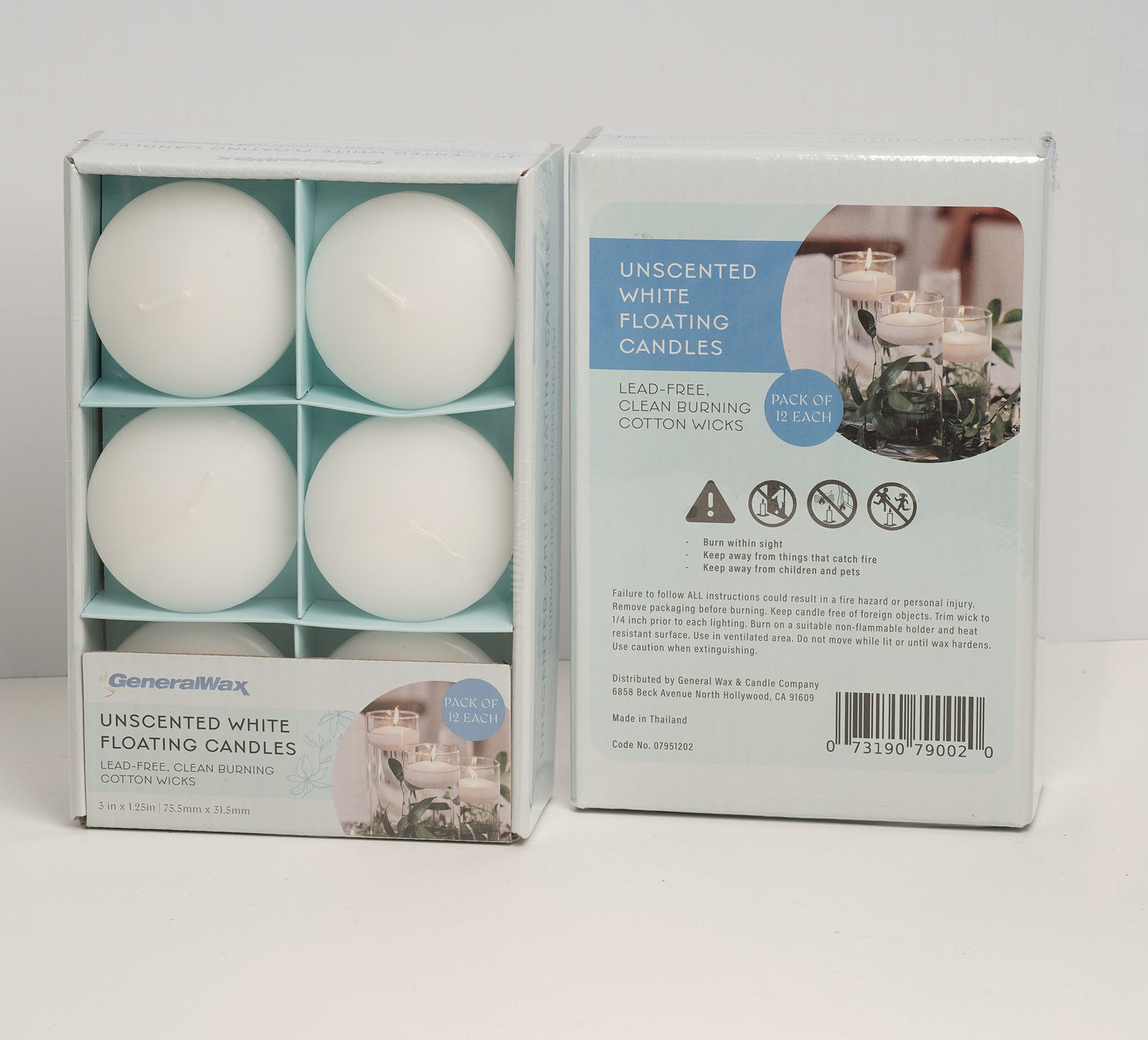 White floating candles for centerpieces and pool décor