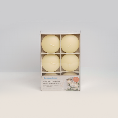 Box of 12 ivory round floating candles by General Wax