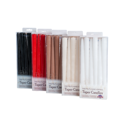 Set of five packages of taper candles in various colors background
