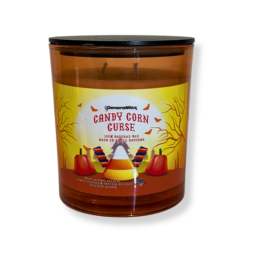 Candy Corn Curse scented candle in a maple glass jar with candy corn and pumpkin artwork