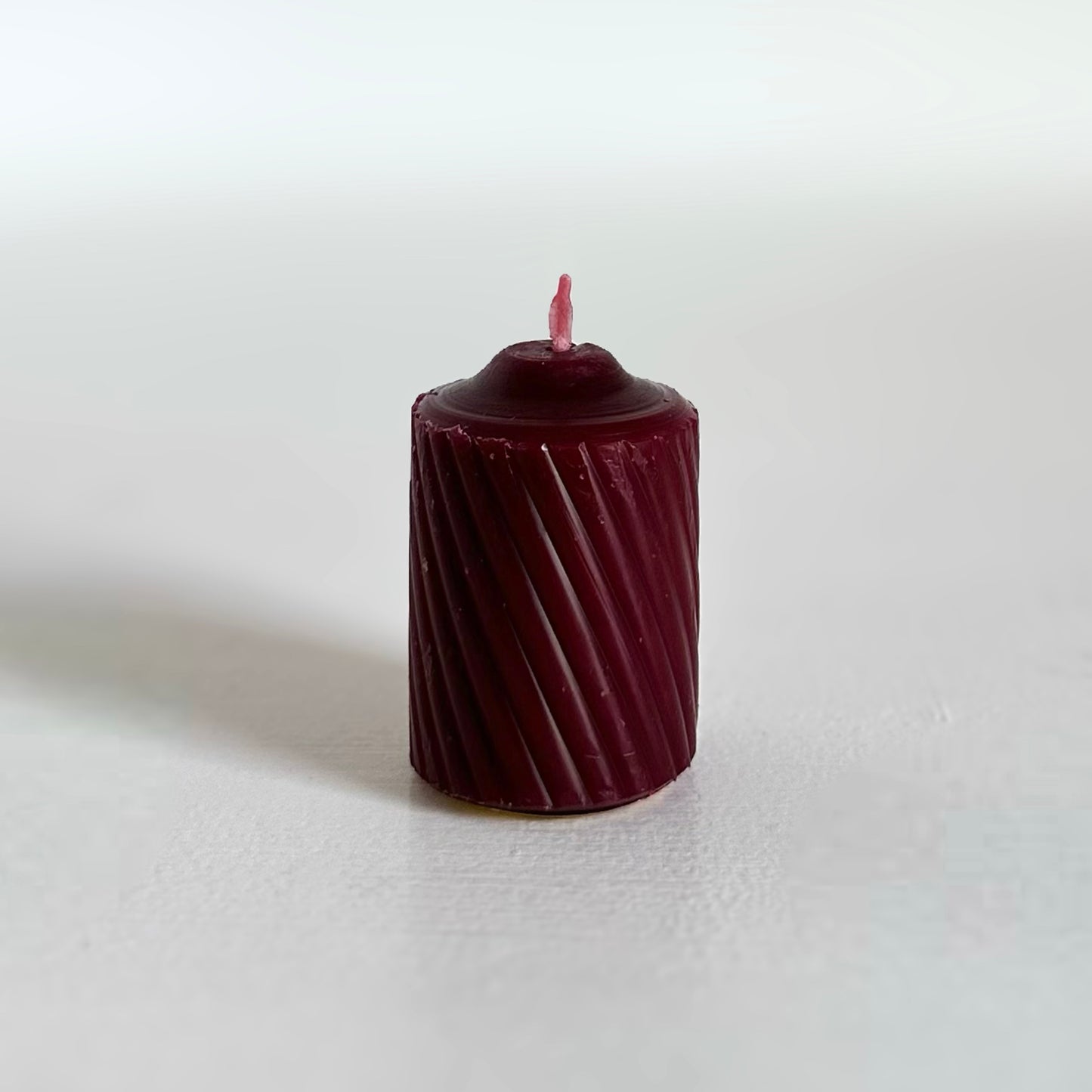 Hand poured mulberry burgundy votive