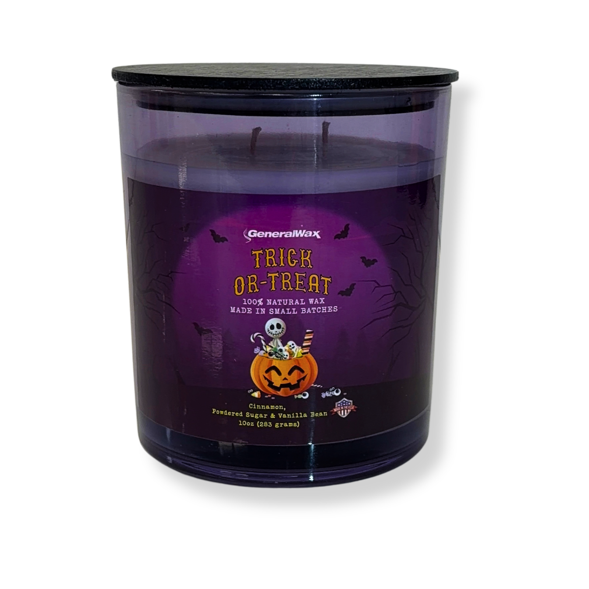 Trick-Or-Treat scented candle in a violet glass jar with Halloween artwork