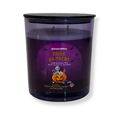 Trick-Or-Treat scented candle in a violet glass jar with Halloween artwork