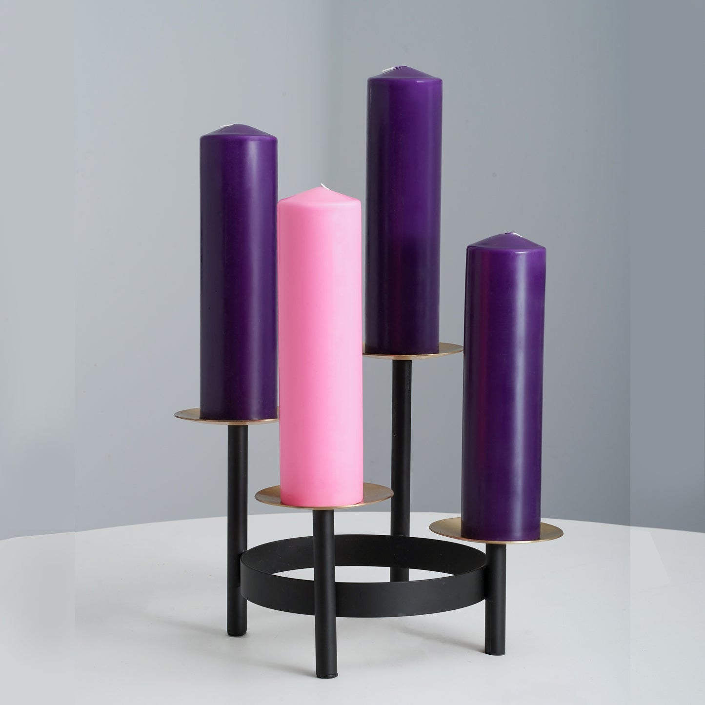 advent pillar candles on a holder
