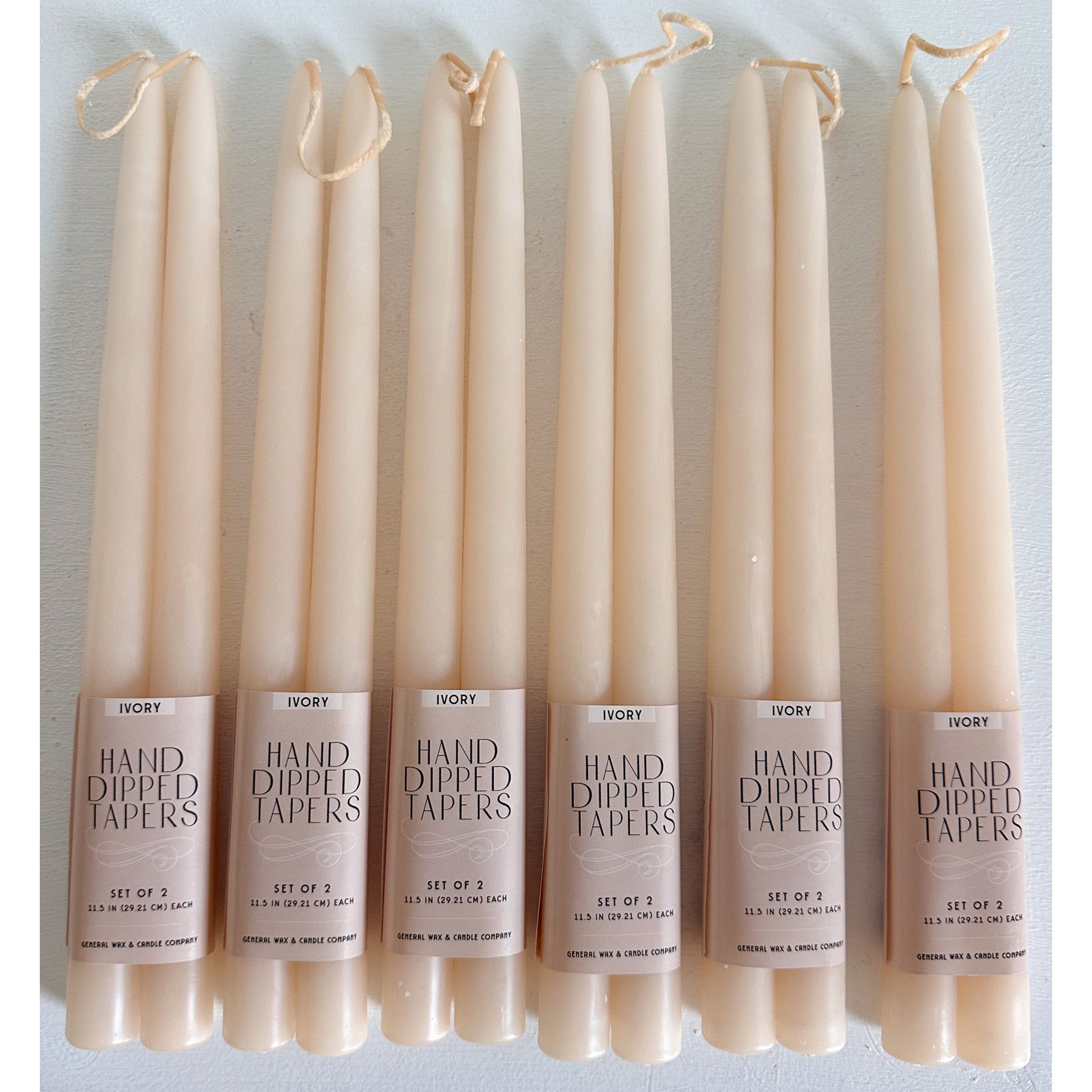 classic ivory taper candles for weddings and events